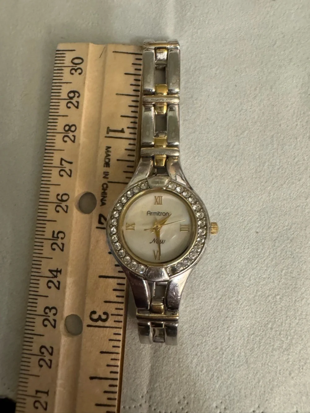 Armitron Two-Tone Silver and Gold Crystal Bezel Women's Watch